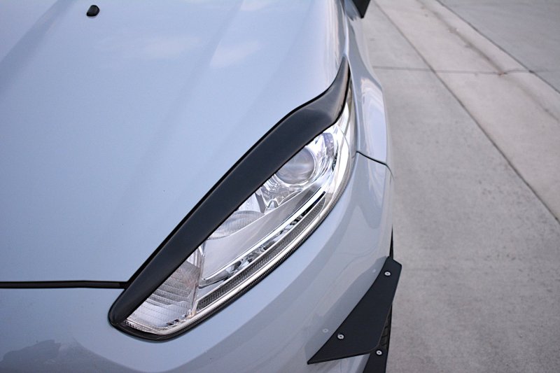 Maxton Scheinwerfer Blenden Böser Blick V.1 für Ford Fiesta ST / ST-Line / Standard Mk7 FL schwarz Hochglanz FO-FI-7F-ST-L1-G